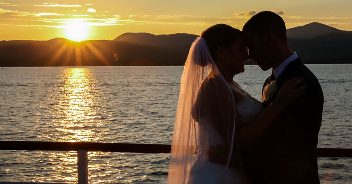 bride and groom at sunset