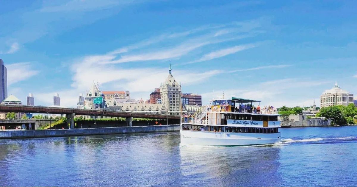 cruise boat near city