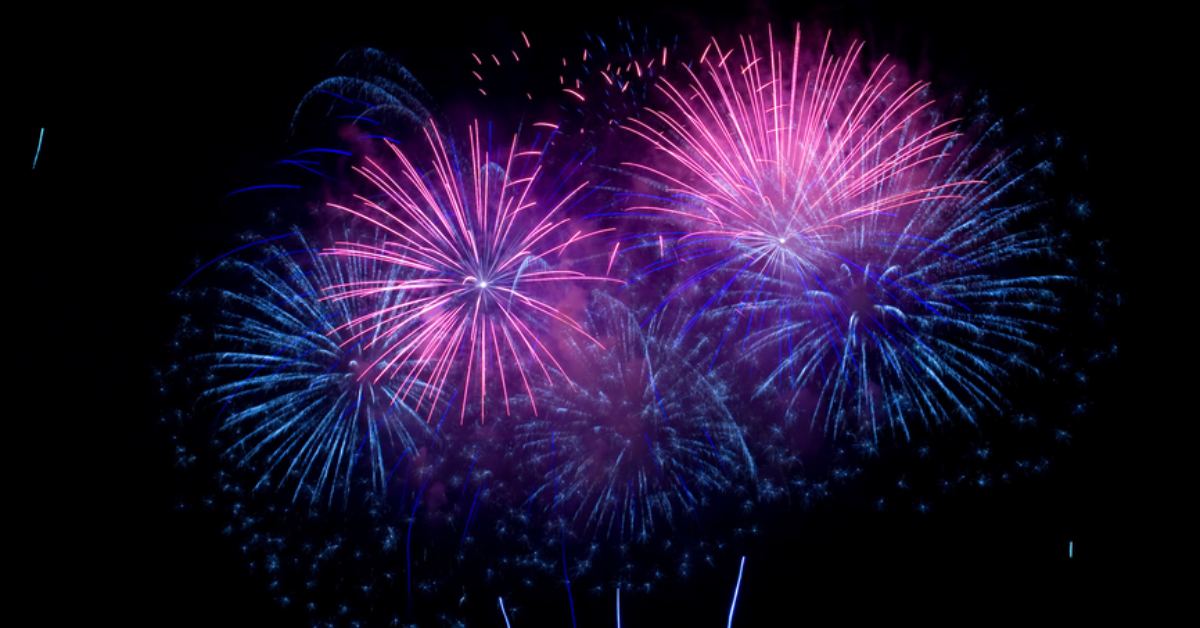 purple and blue fireworks at night