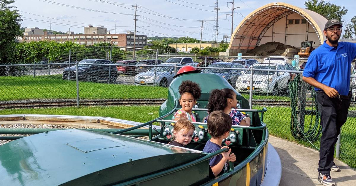kids on caterpillar ride at huck finn's playland