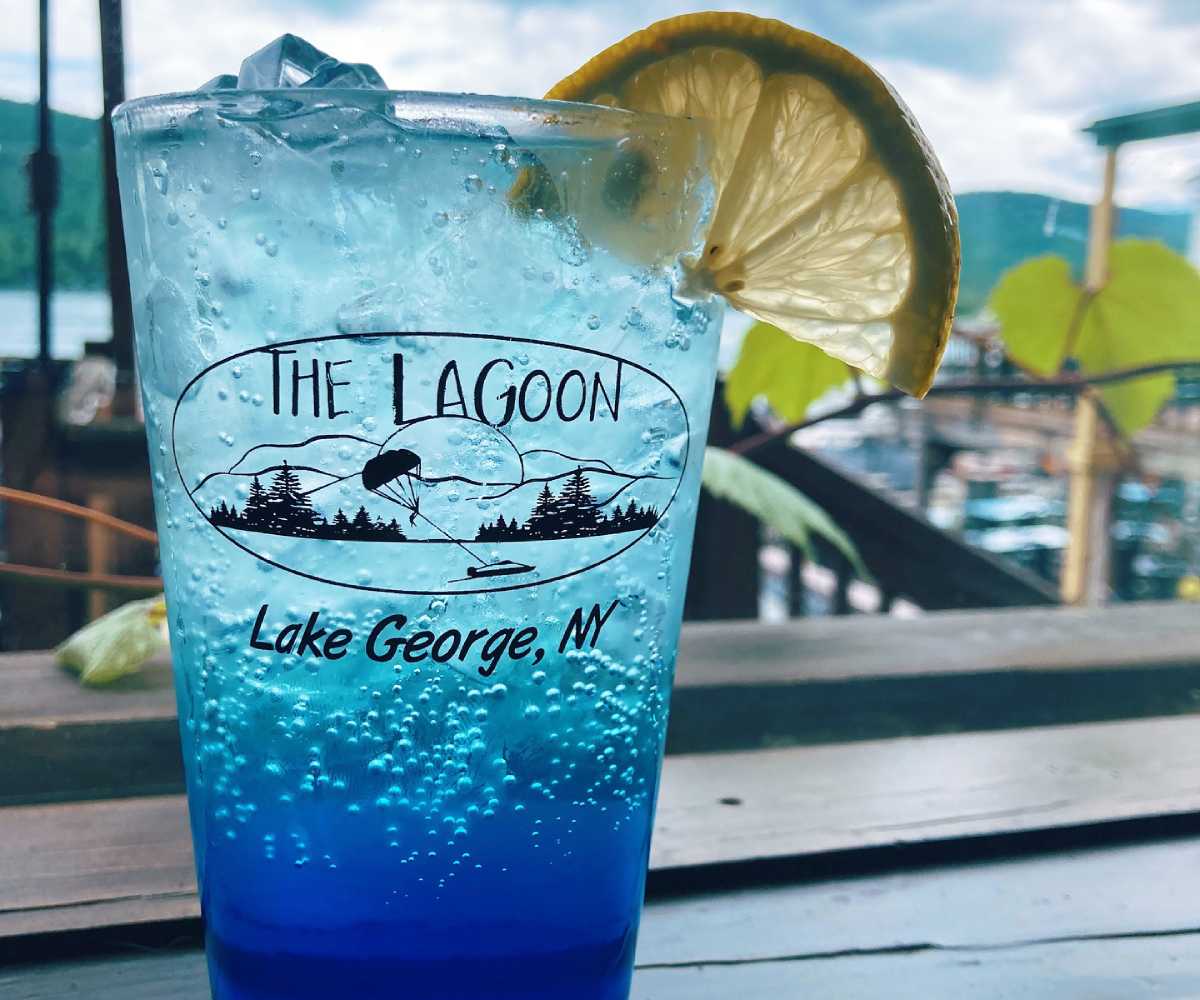cocktail glass with the lagoon lake george logo