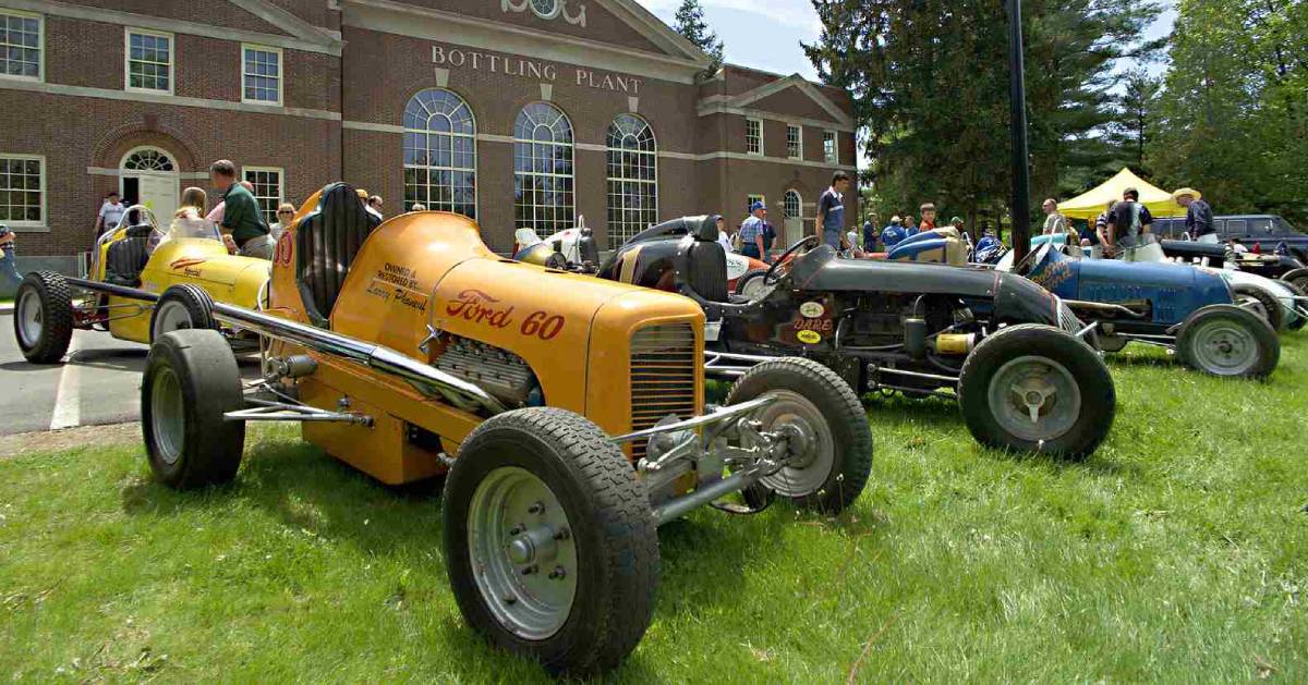 classic cars lined up for a show