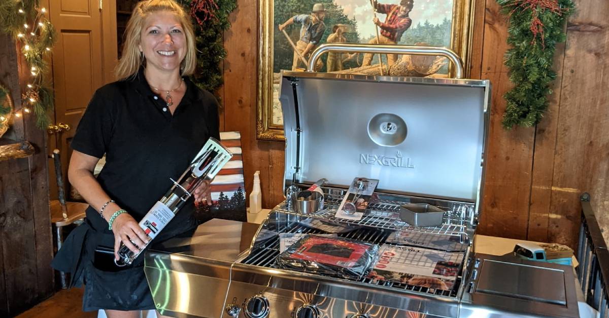 woman poses with new grill