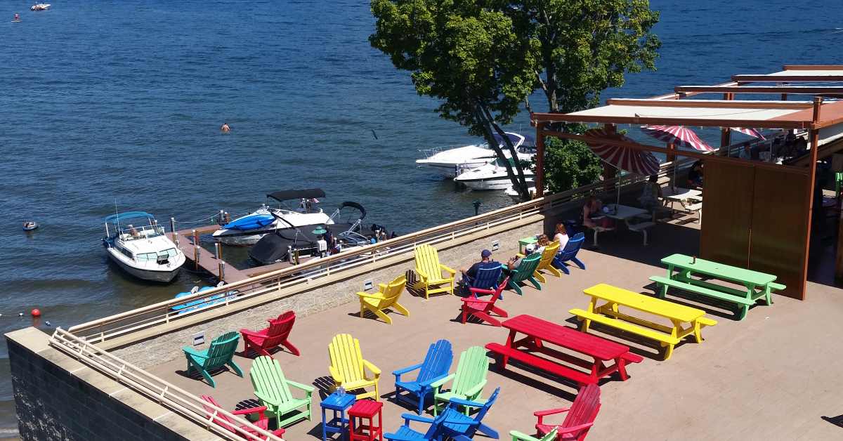 colorful chairs and tables on a hotel roof