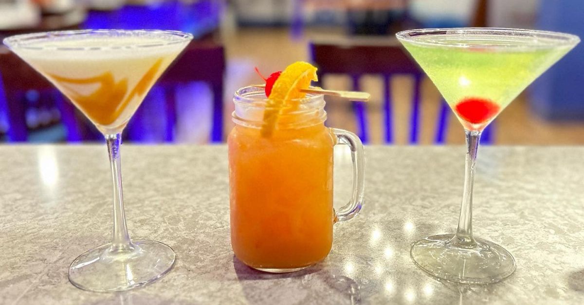 three cocktails on a table