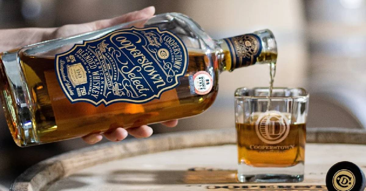 Cooperstown Bottle pouring a glass of whisky