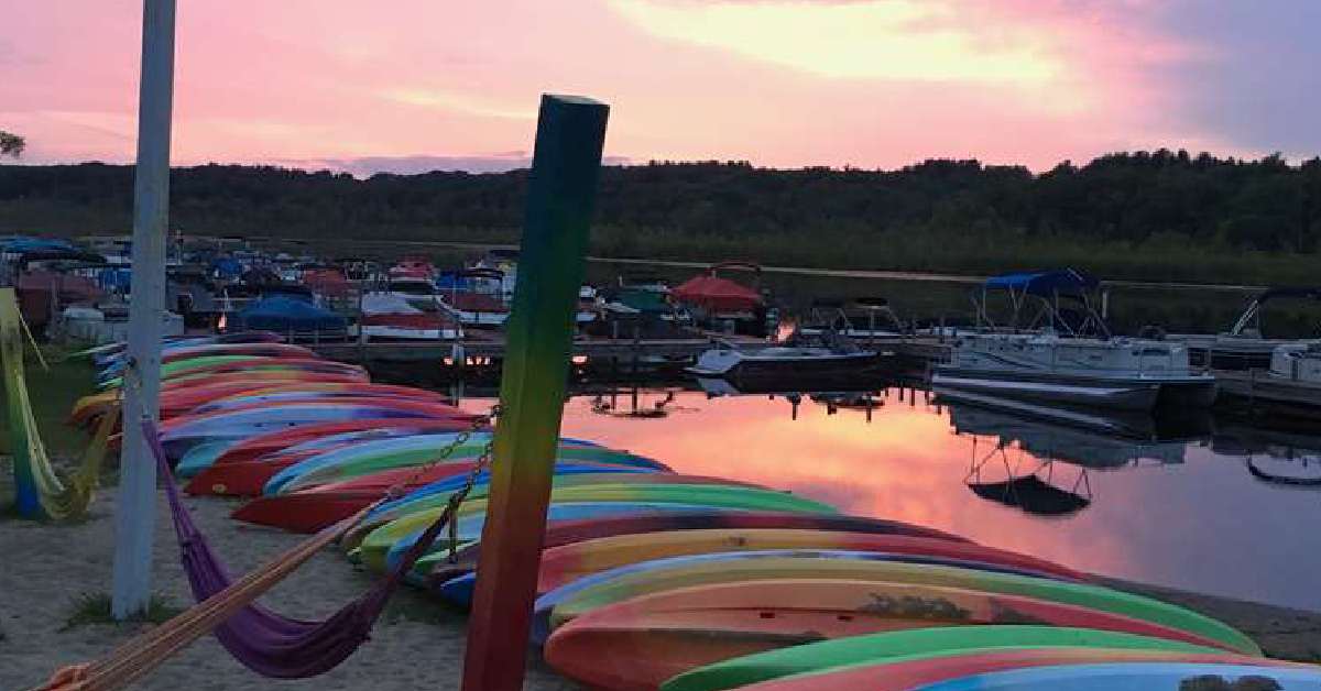 Kayaks lined up water side