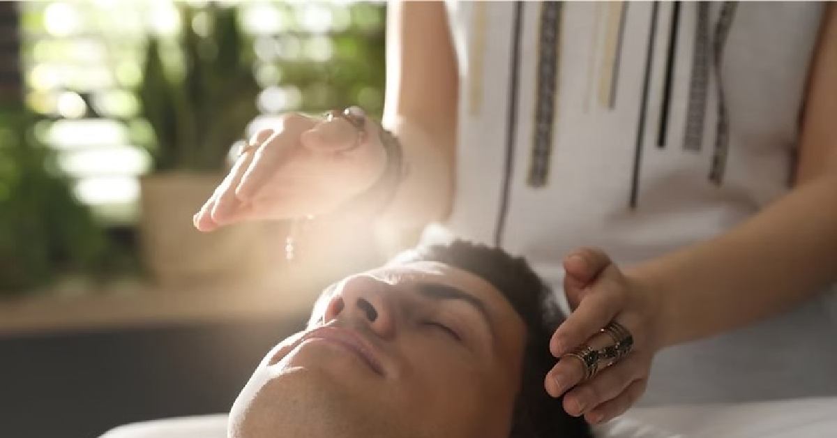 Man Being healed with Reiki practices 