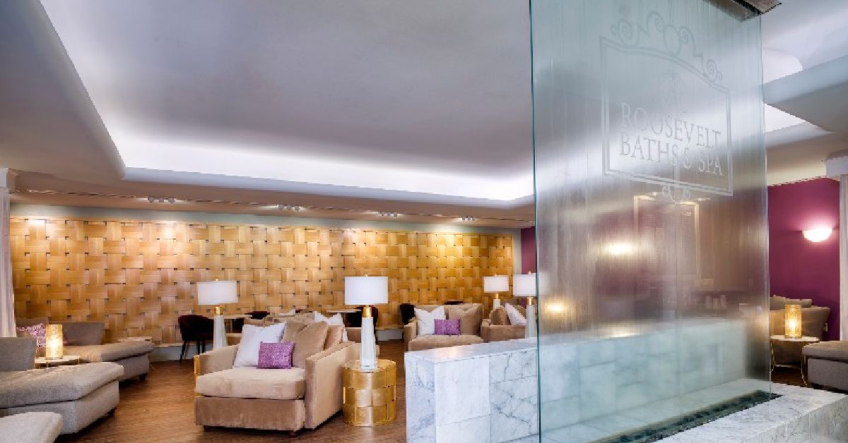 lobby of a spa with many lounge chairs