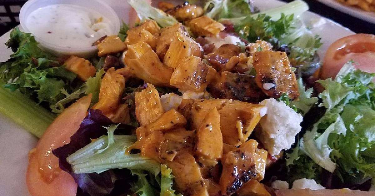 Chicken on greens with cheese