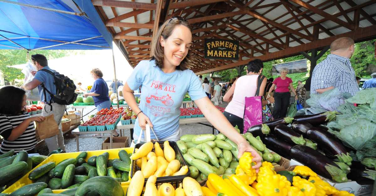 Woman Buying Produce at the Saratoga Farmers Market