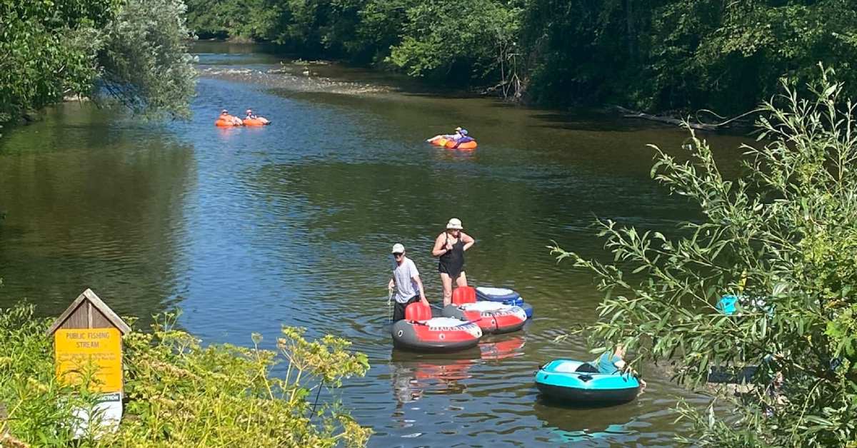people on tubes on a river