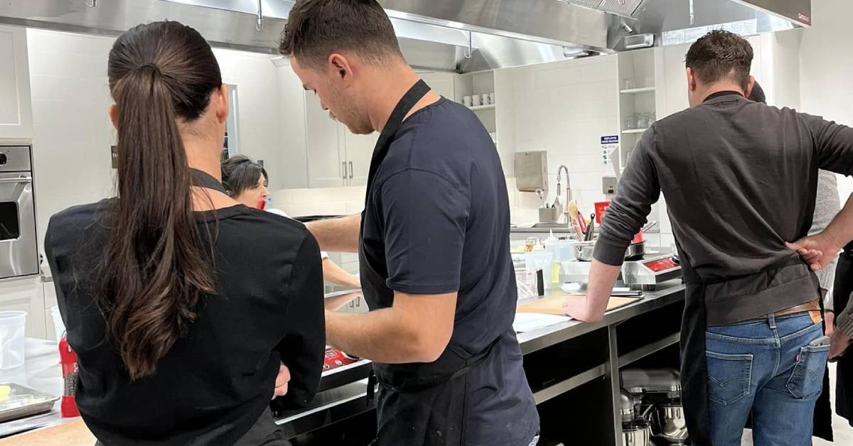 people taking a cooking class