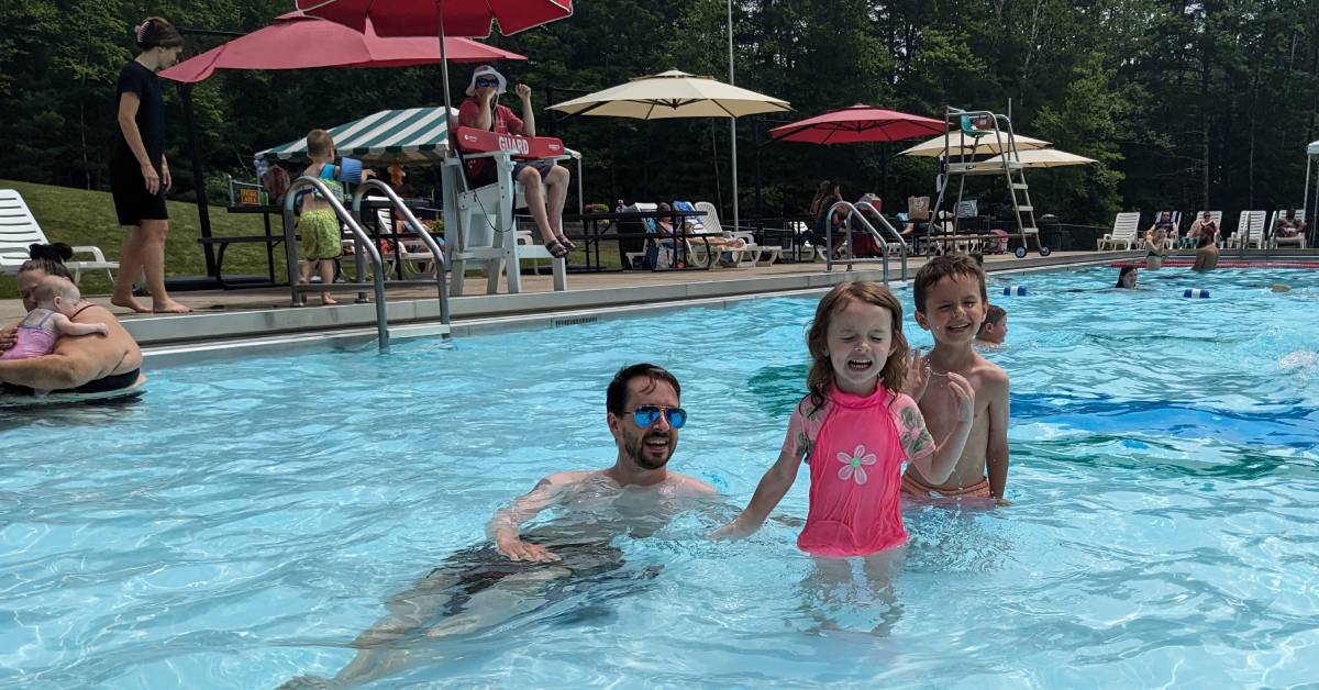 dad with kids at gurney lane pool