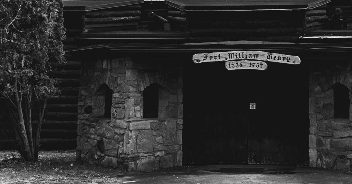 black and white exterior of fort william henry museum