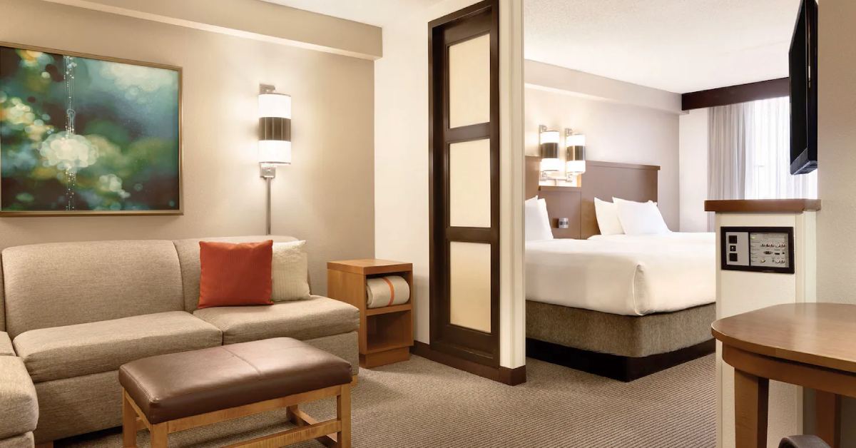 hyatt place room with bed and sofa couch
