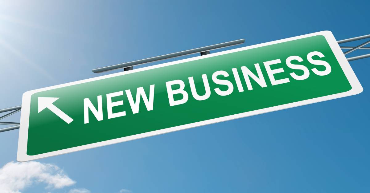 new business road sign with arrow