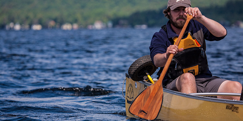 guy paddling alone