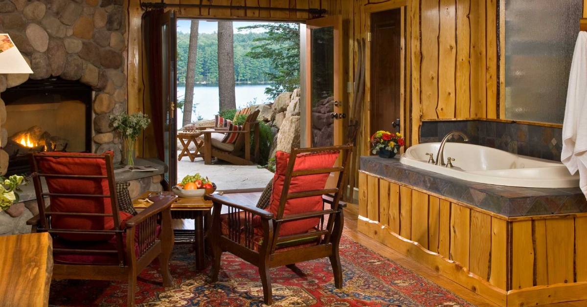 fern lodge room with hot tub and back door