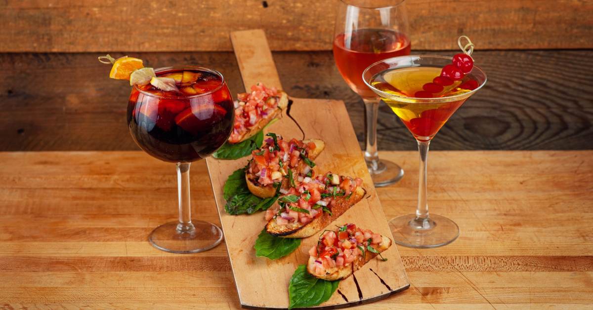 three cocktails and bruschetta board