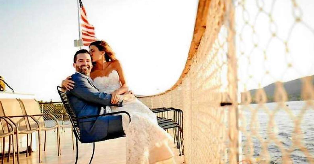 Couple enjoying there special day on the boat deck 