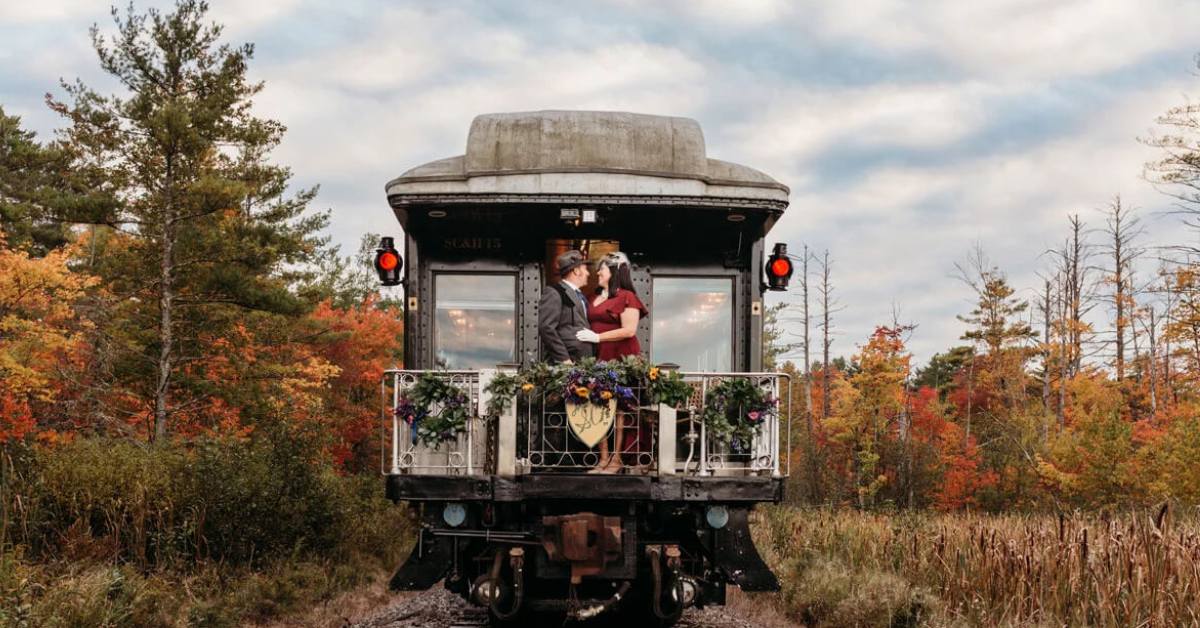 Couple on a train pulling away