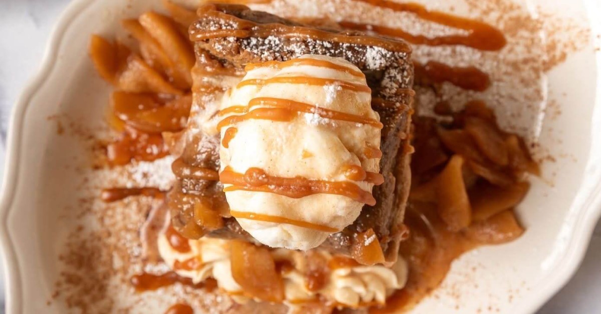 Piece of french toast with icing on top.
