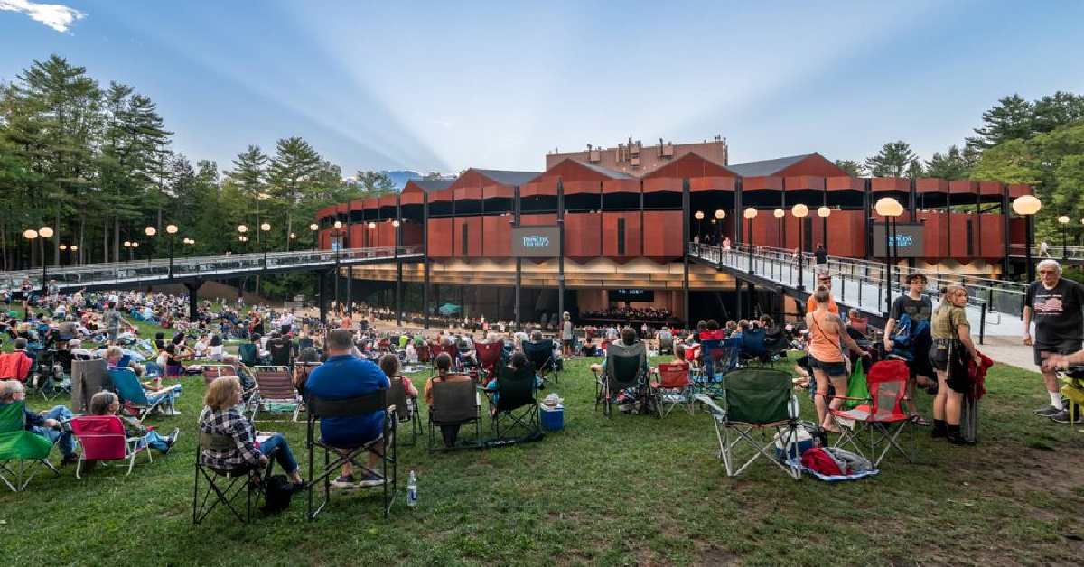 people seated on lawn at SPAC