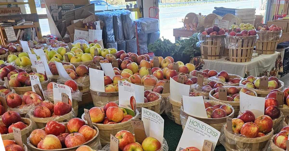 bags of apples in a store