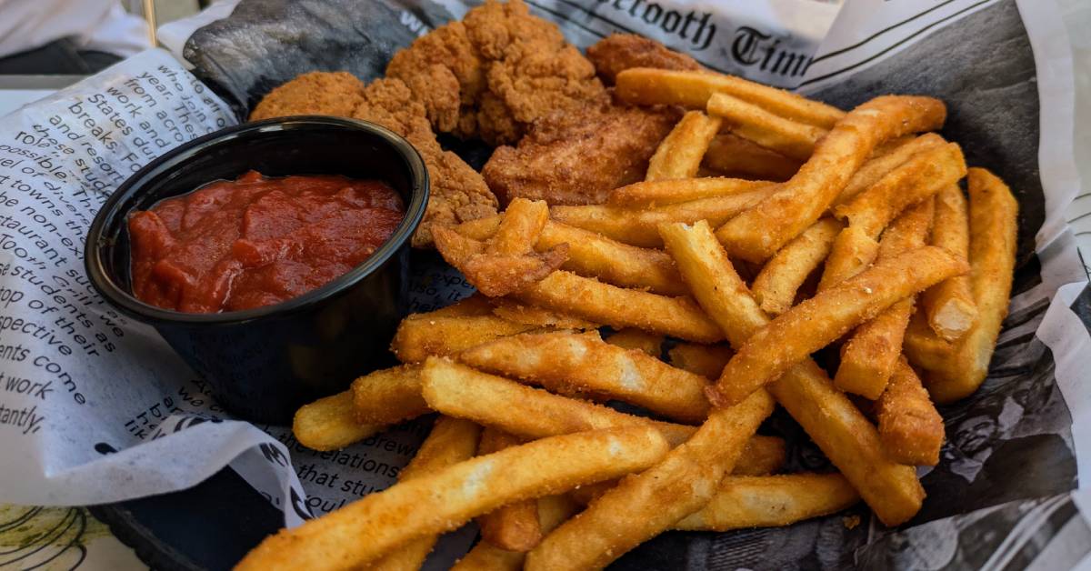 chicken fingers and french fries with dipping sauce