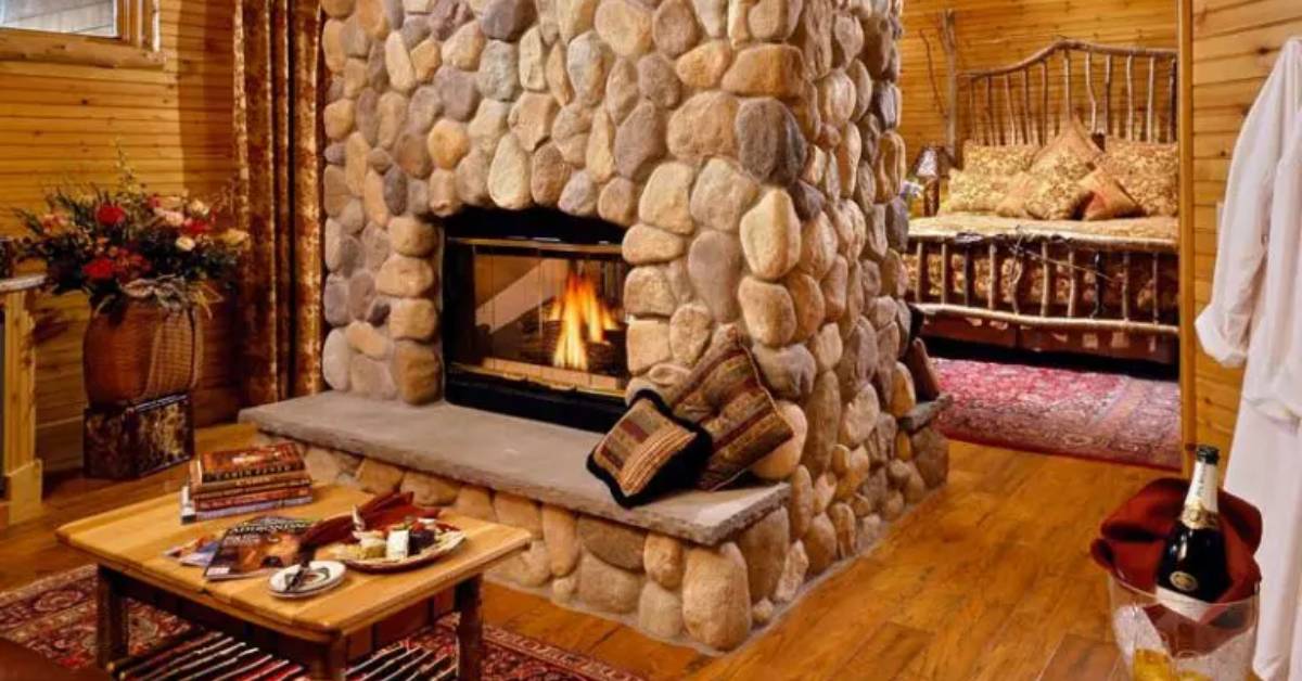 bedroom with fire in fireplace