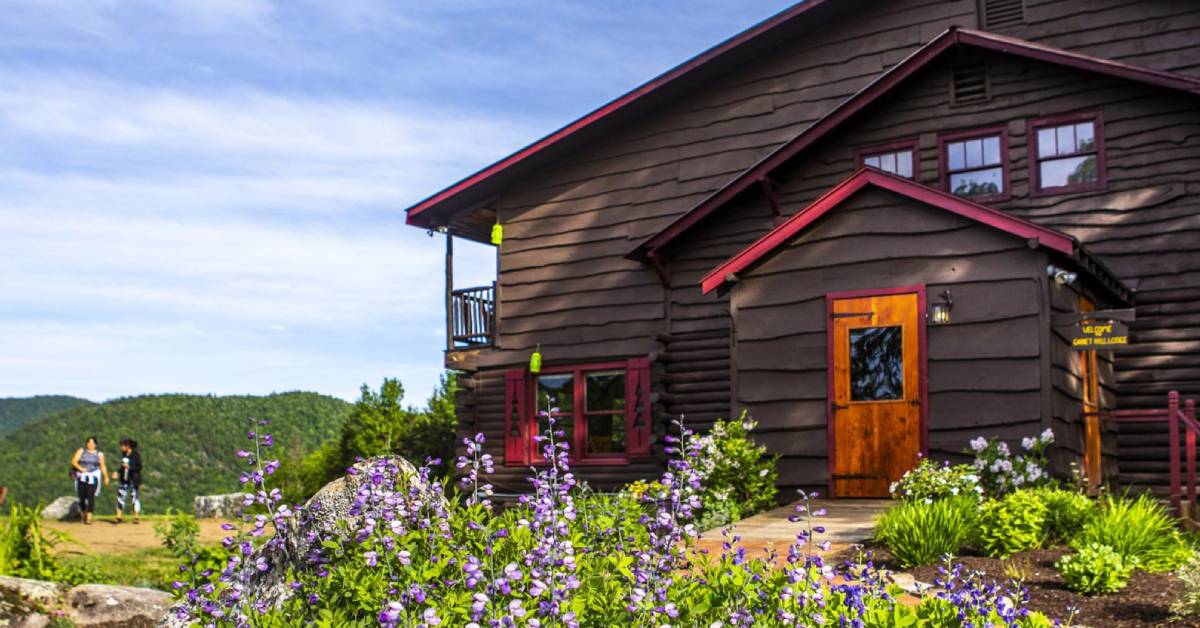 exterior of garnet hill lodge with people walking nearby