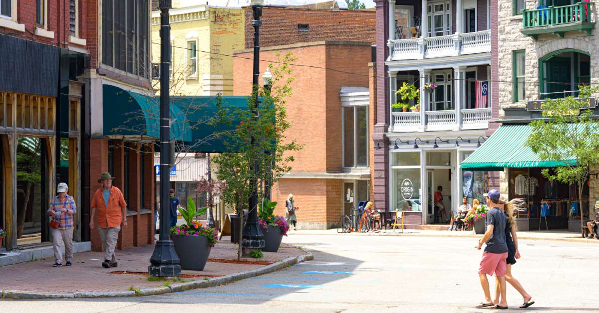 people walking around a town