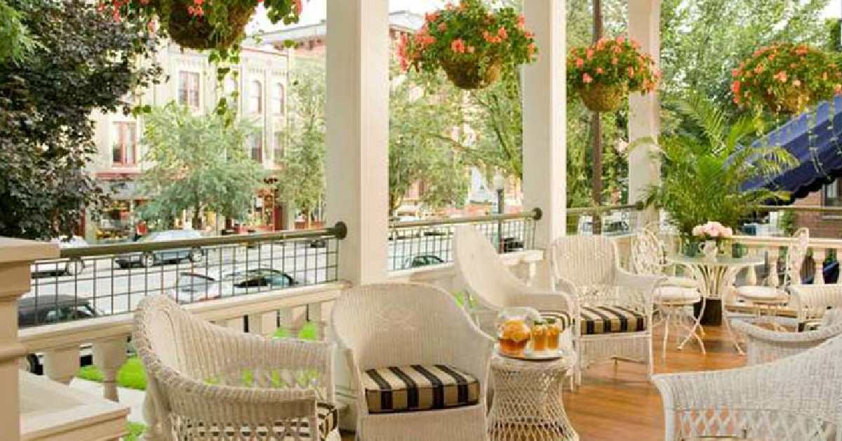 Image shows the porch area and view of the Saratoga Arms.