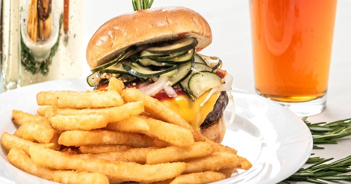 lakeside restaurant and lounge burger with pickles and fries