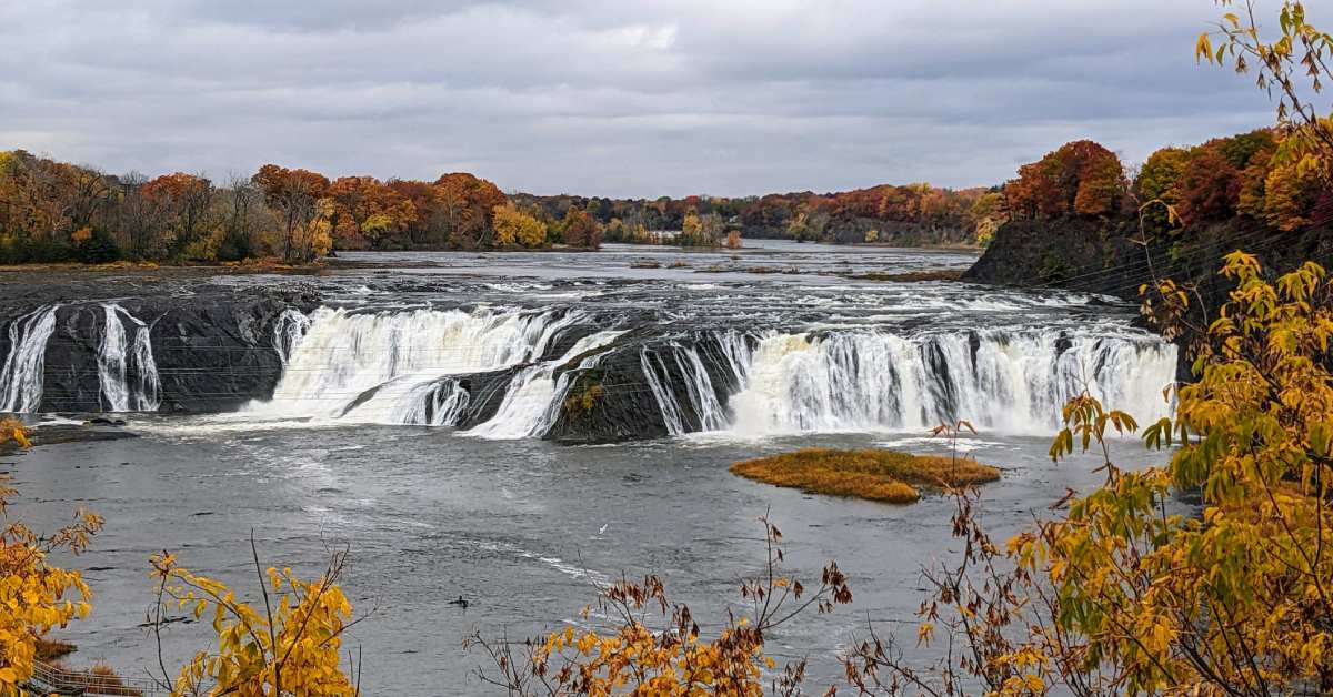cohoes falls with fall colors on the surrounding trees