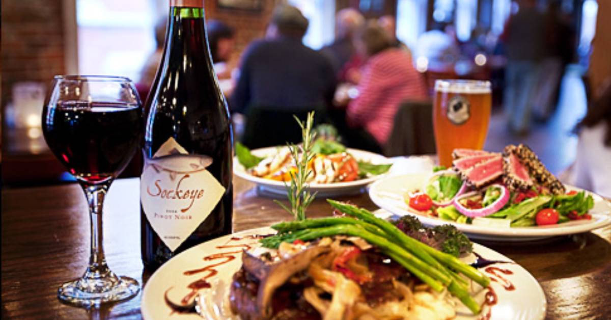 food, wine, and beer on a table