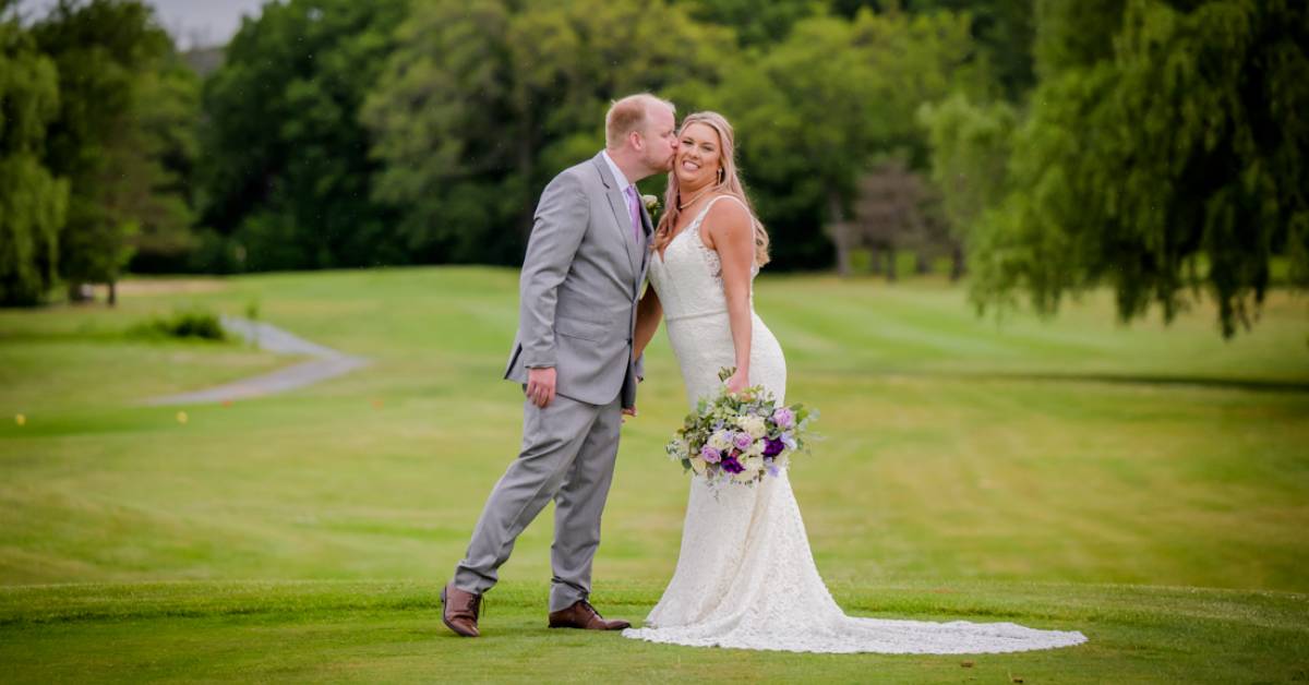 groom and bride on golf course