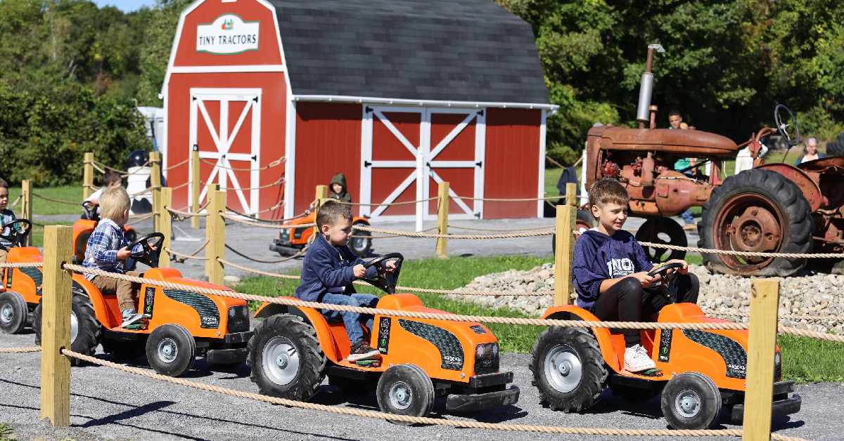 kids on orange tractors
