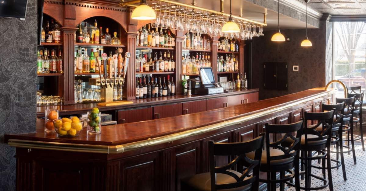 seats at an upscale bar