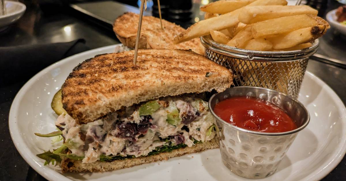 grilled cranberry chicken sandwich with fries