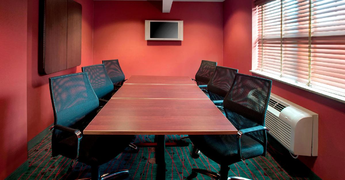 small conference room with red walls
