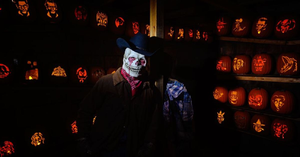 skeleton man by jack o lanterns