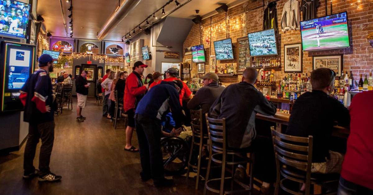 people seated at a sports bar