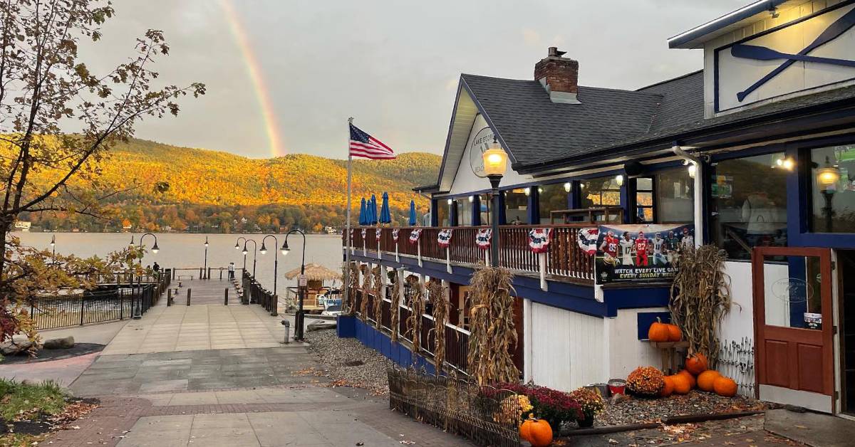 lake george beach club in fall with rainbow