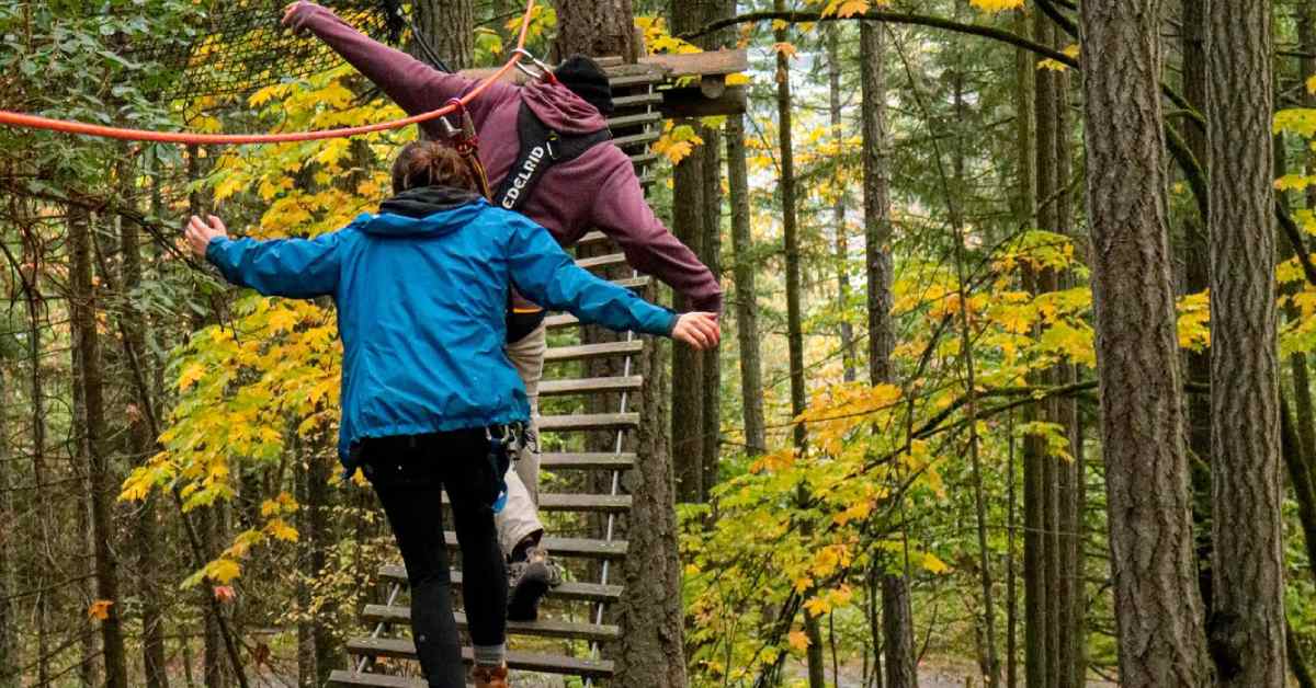 two people on a wooden walkway