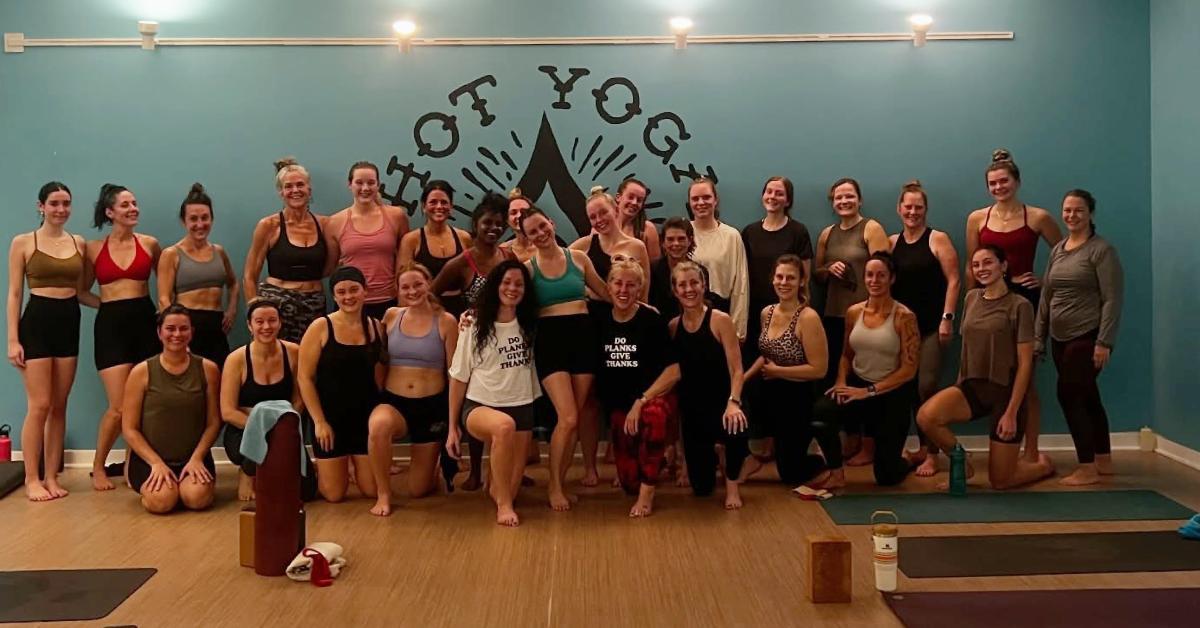 group of hot yoga class attendees