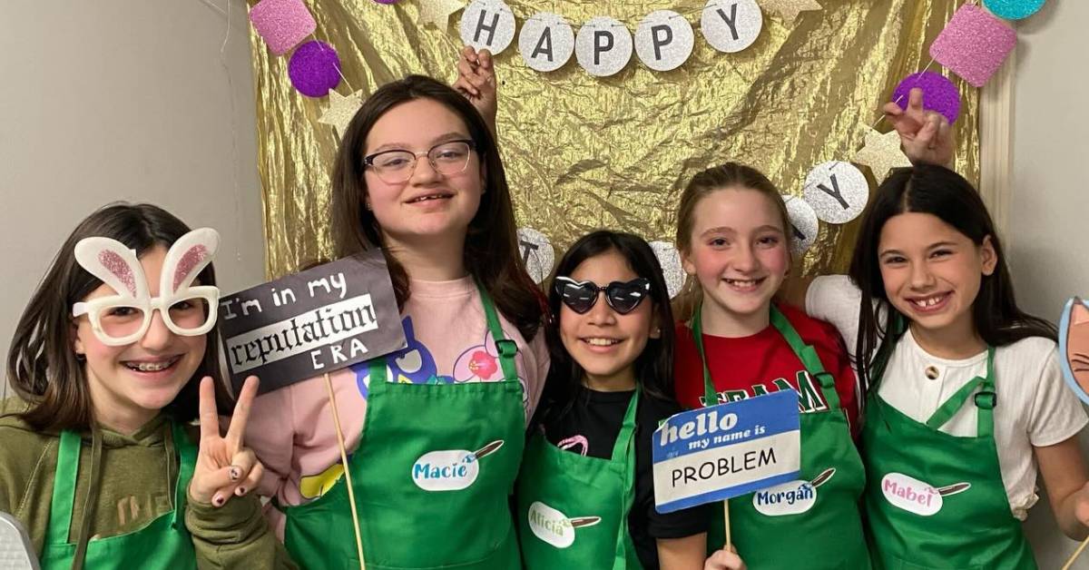 kids pose for swiftie themed party