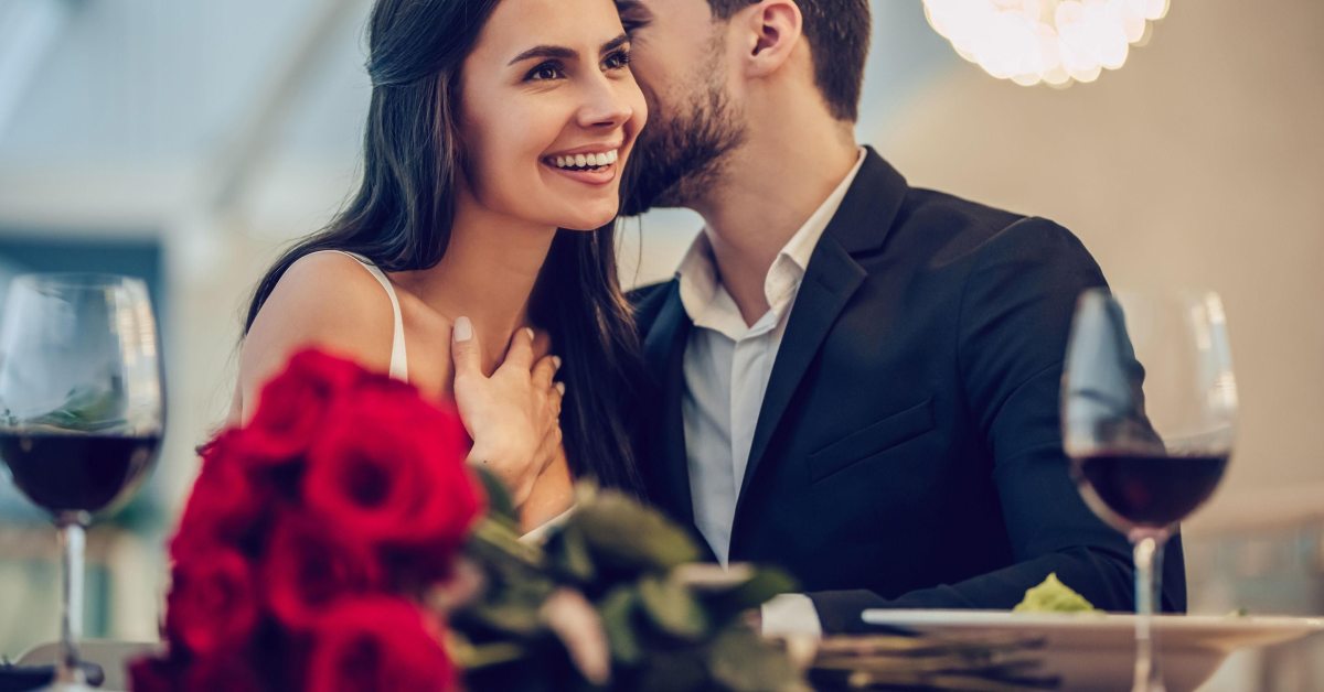 man and woman dressed for romantic dinner