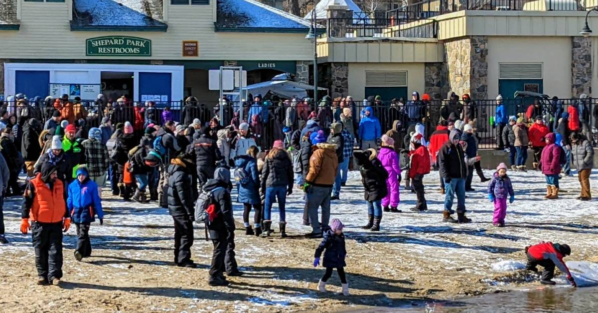 shepard park in winter, restrooms sign behind large crowd